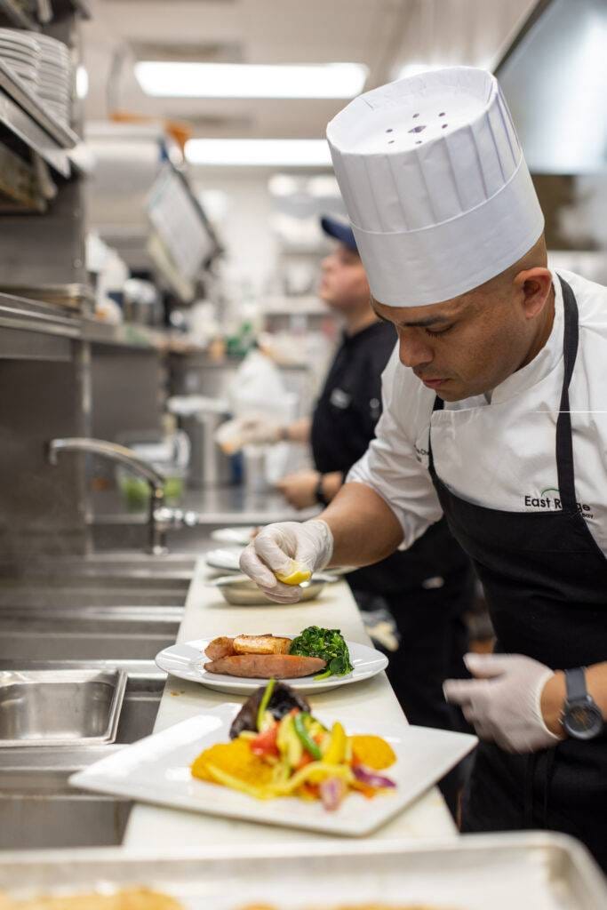 chef preparing a dish at East Ridge