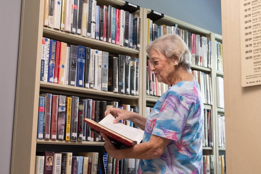 a women perusing east ridge's library
