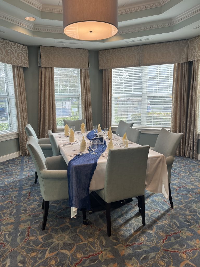 table set for a birthday lunch at east ridge village at cutler bay