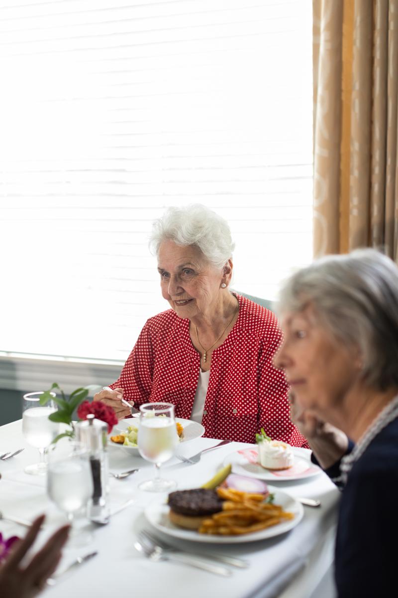 two women eating dinner