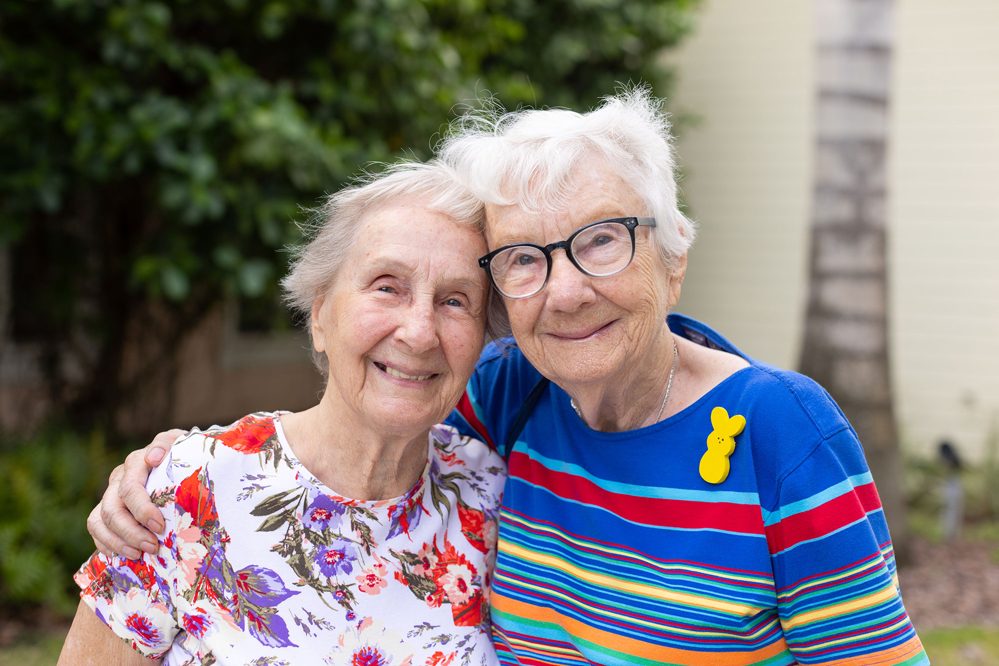 Two senior women at East Ridge at Cutler Bay's Palm Court